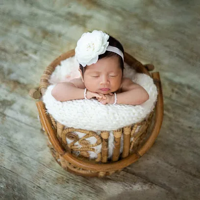 Image de Photographe spécialisée Grossesse, Nouveau-né & Bébé à Louvres (95)